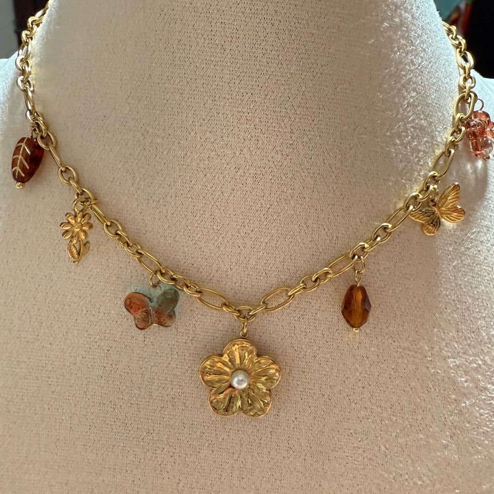 Gold Charm Necklace with Floral and Butterfly Accents steel 316l
